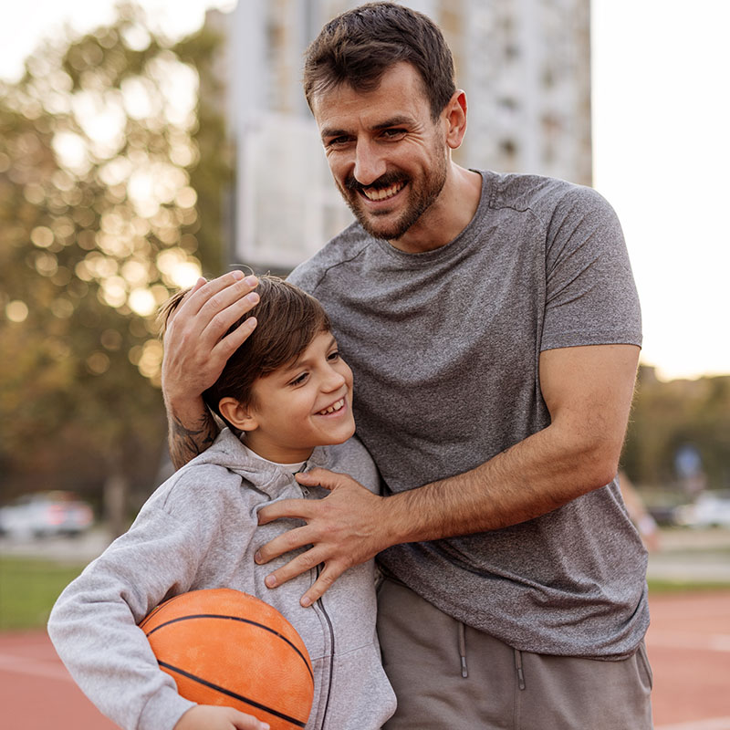 Dad and Son Together on the Court